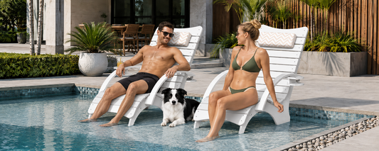 Couple relaxing on white in-pool loungers on a modern pool sun shelf