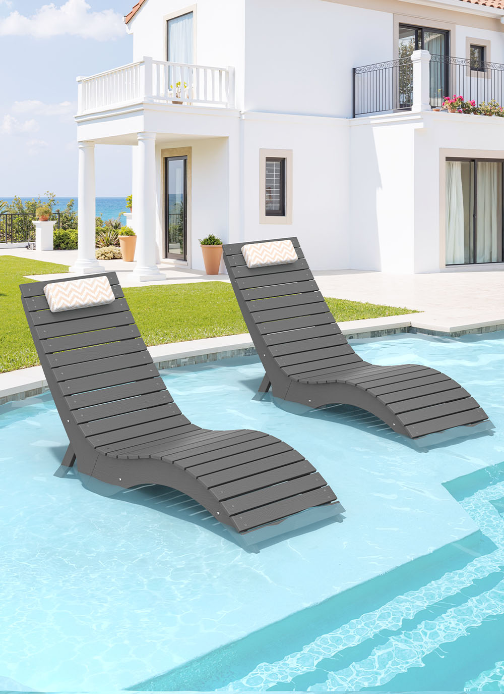 In-pool lounge chairs placed on a sun shelf in a private pool