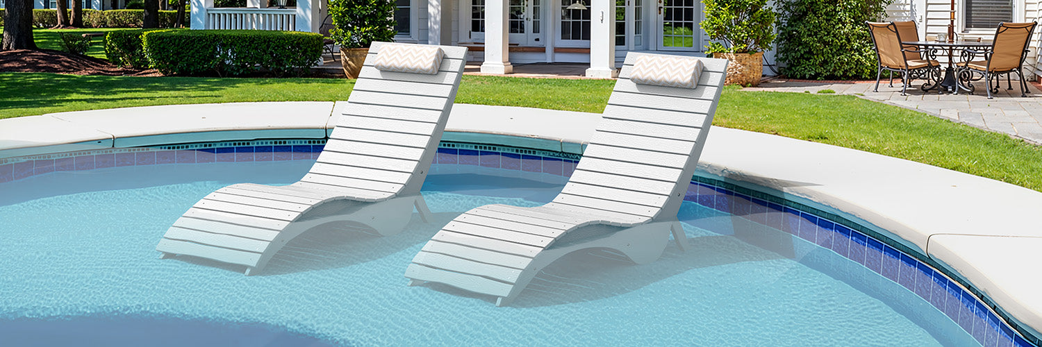 sun shelf chairs placed on a shallow tanning ledge in the pool