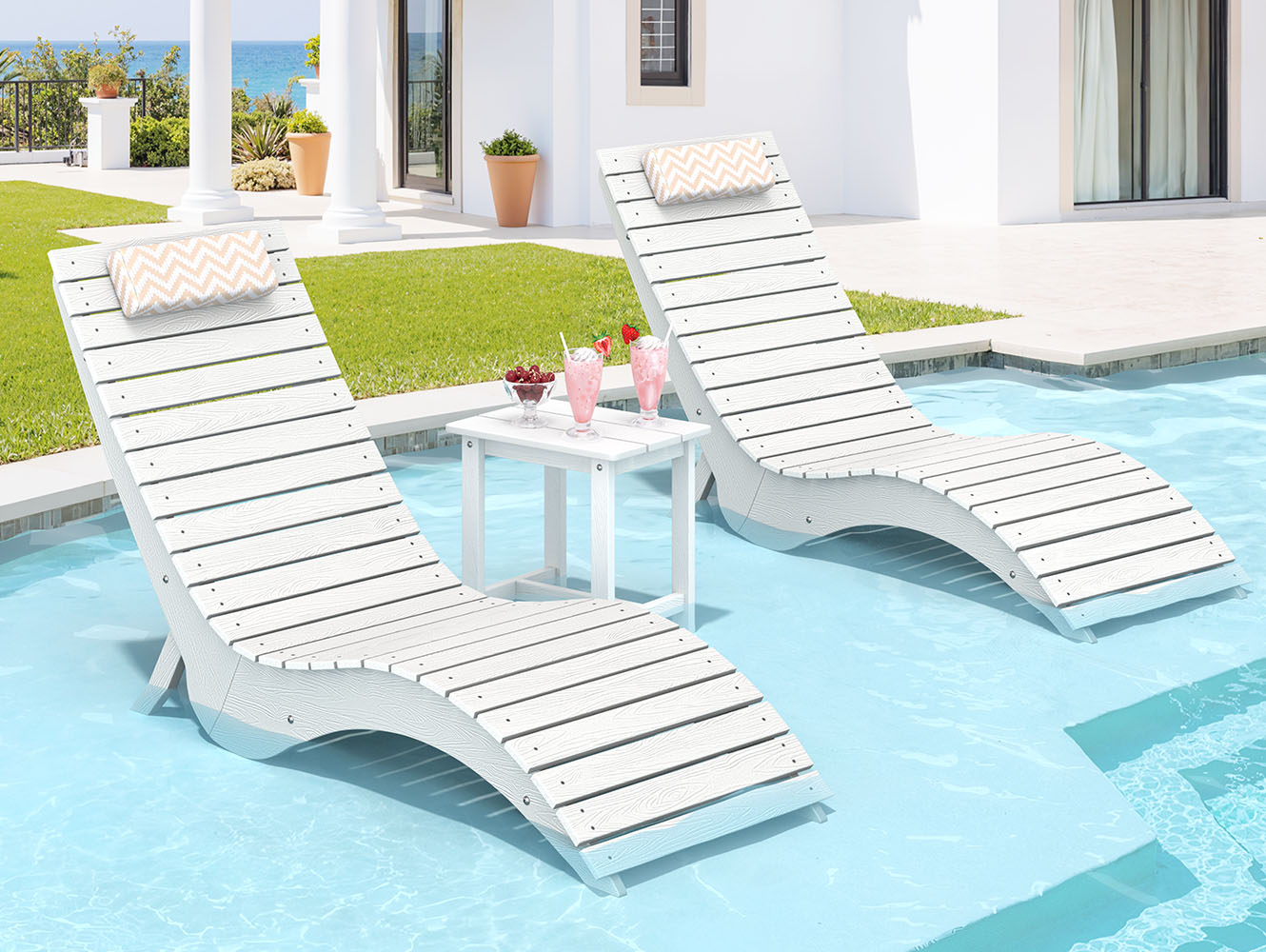 modular in-pool lounge chairs with matching side table in shallow pool area